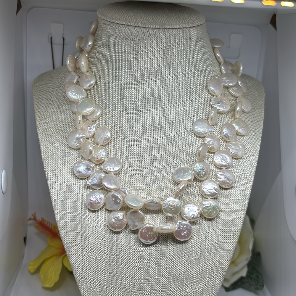 12mm freshwater coin dancing pearl necklace. Hand knotted with vermeil toggle